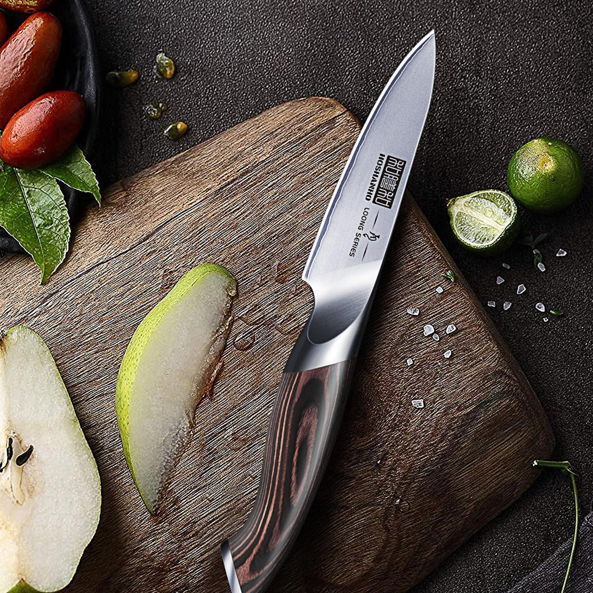 Couteau d'office japonais Hoshanho Loong Series lame inox manche pakkawood – découpe poire et citron vert sur planche bois