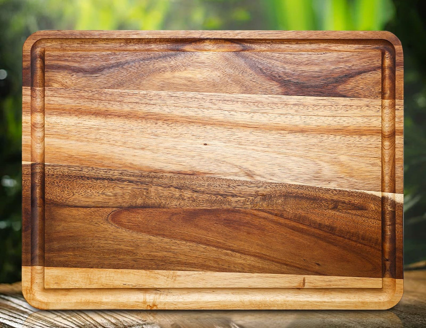 Planche à découper bois acacia rainure jus poignée – vue de face fond naturel vert