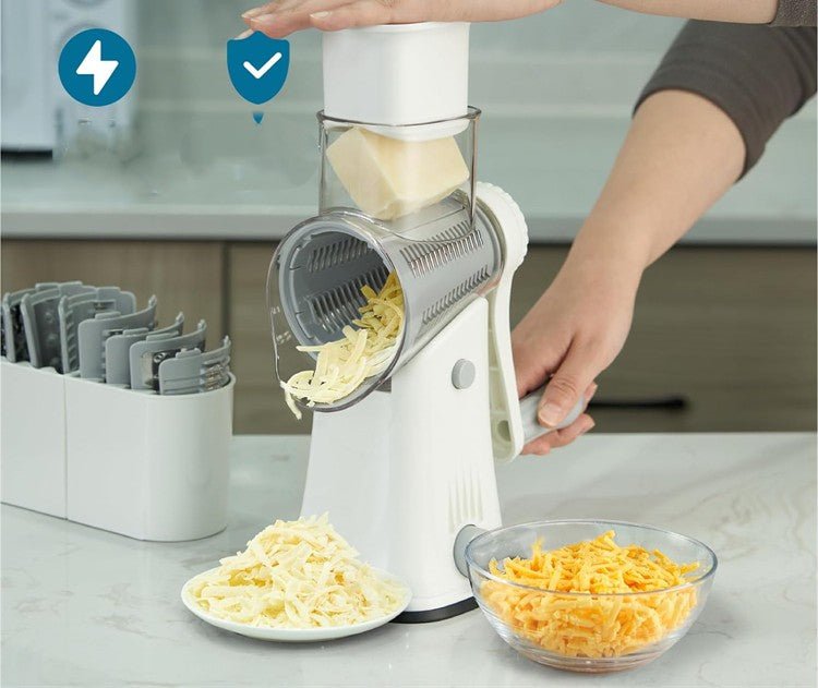Râpe manuelle rotative blanche – râpage carotte julienne dans bol transparent – vue de face