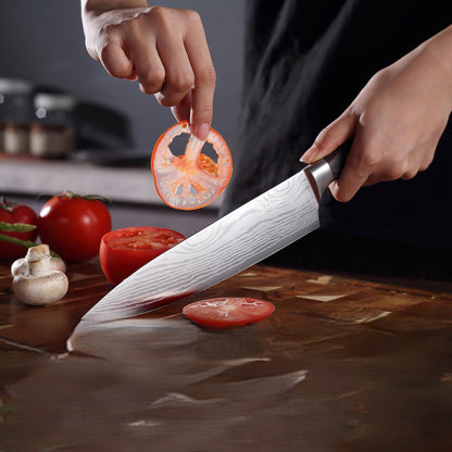 Couteau chef Paudin Damascus tranchant une tomate ultra fine – précision et netteté de la lame